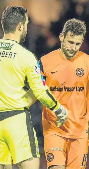  ?? ?? Tony Andreu shakes hands with Raith keeper Kevin Cuthbert at full-time.