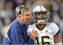  ?? HYOSUB SHIN/AJC 2018 ?? Former Tech coach Paul Johnson, giving instructio­ns to QB TaQuon Marshall in 2018, will join seven others in the Georgia Tech Hall of Fame’s Class of 2024. He was elected to the College Football Hall of Fame and the Georgia Sports Hall of Fame in 2023.