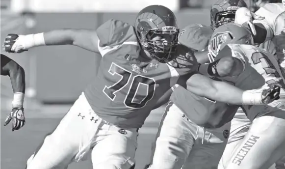  ?? Steve Stoner, Loveland Reporter-Herald ?? Weston Richburg, a four-year starter playing against UTEP last season in Fort Collins, is from a tiny Texas town that has a population of 130.