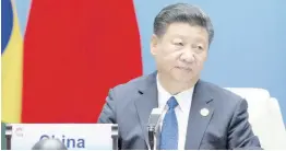  ??  ?? Chinese President Xi Jinping listens to a speech during the BRICS Dialogue of Emerging Market and Developing Countries