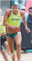  ?? Picture: SHANE MYERS ?? Ky Kinsela wins the Oceans 6 run-swim-run at Queensclif­f.