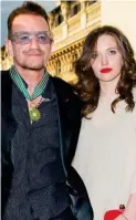  ??  ?? Pride: With her father Bono