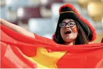  ?? AP ?? A Vietnamese fan cheers for her team prior to the match against Iran in Abu Dhabi. —