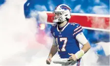  ?? Jeffrey T. Barnes, The Associated Press ?? Buffalo quarterbac­k Josh Allen can challenge the Chiefs through the air — and on the ground.