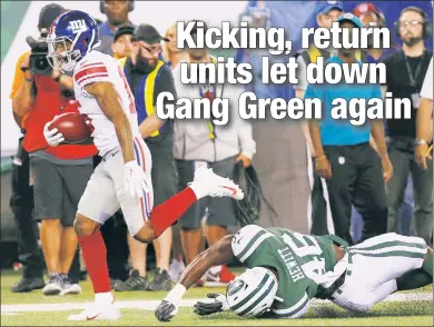  ?? Paul J. Bereswill ?? GONE BABY GONE: Hunter Sharp of the Giants breaks away from the Jets’ Neville Hewitt as he returns a punt 55 yards for a touchdown in the first quarter of Big Blue’s 22-16 victory on Friday night. The play was one of a number of special teams mistakes by the Jets.