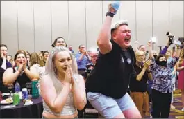  ?? Dave Kaup AFP/Getty Images ?? ABORTION RIGHTS supporters celebrate in Overland Park, Kan., on Tuesday that voters rejected a measure that would have allowed a statewide abortion ban.