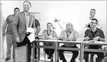  ??  ?? Muscat prepares to cast his vote at a polling station in his home town of Burmarrad. — AFP photo