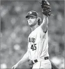  ?? MICHAEL WYKE/AP ?? Gerrit Cole waves to the Houston crowd after exiting the Astros’ 3-1 win Saturday with 15 strikeouts in 72⁄ scoreless innings.