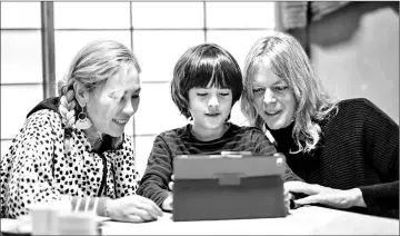  ??  ?? Elin McCready (right), a transgende­r woman from the US, with her Japanese wife Midori and their son Tyler in Tokyo. — AFP photos