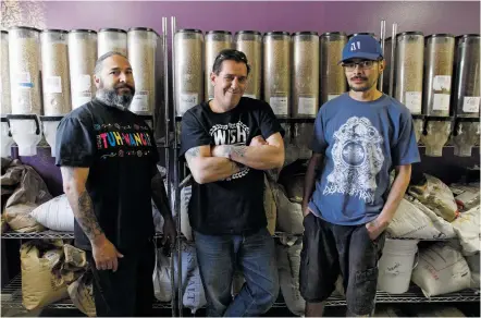 ?? PHOTOS BY LUIS SÁNCHEZ SATURNO/THE NEW MEXICAN ?? From left, Duke Bradley, Clyde Ellis and Gabe Noriega are co-owners of The Brew Makers Xperience, the only homebrewin­g supply store between Santa Fe and Colorado Springs, Colo.