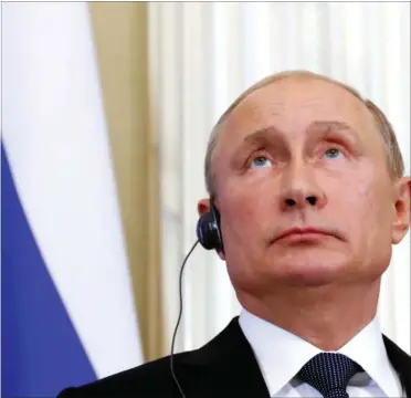  ?? FOTO: AP ?? Er det ikke lige lovligt bekvemt, at Putin og russerne får skyld for snart sagt al opstandels­e i Vesten?