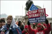  ?? JOSHUA A. BICKEL — THE COLUMBUS DISPATCH VIA AP, FILE ?? Supporters of President Donald Trump rally on Jan. 6, 2021, at the Ohio Statehouse in Columbus, Ohio.