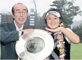  ??  ?? Ken Shimura, left, at Akagi Country Club in Japan.