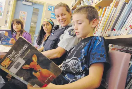  ?? TIMES COLONIST FILE ?? Encouragin­g kids to read at an early age can engender a love of books that lasts a lifetime.