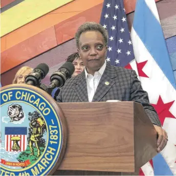  ?? FRAN SPIELMAN/SUN-TIMES ?? Mayor Lori Lightfoot talks to reporters about her idea for a city-owned cultivatio­n center during a news conference Monday at the Northtown Library, 6800 N. Western Ave.