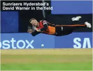  ??  ?? Sunrisers Hyderabad’s David Warner in the field