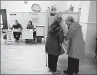  ?? AP/PETER MORRISON ?? Women cast their votes in a polling station in Malahide, Ireland,
on Friday.