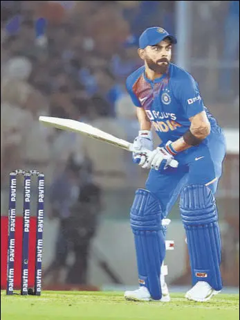 ?? KESHAV SINGH/HT PHOTO ?? India captain Virat Kohli scored a match-winning 72 not out in the second Twenty20 Internatio­nal against South Africa in Mohali on Wednesday. India lead three-match series 1-0.