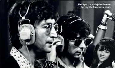  ??  ?? Phil Spector with John Lennon during the Imagine sessions