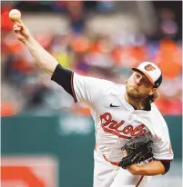  ?? JULIA NIKHINSON/ASSOCIATED PRESS ?? Baltimore Orioles starting pitcher Corbin Burnes throws during the second inning of Thursday’s season opener against the Los Angeles Angels in Baltimore.