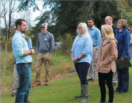  ?? Photo coUrteSY of SchUYlKill river greenWaYS ?? Kent himelright, far left, of the Berks county conservati­on District gives a tour of Sunny acre farm in centre township, Berks county, while discussing the restoratio­n developmen­ts that have been made to the farm in the last year. the farm was a 2017 Schuylkill river restoratio­n fund recipient.