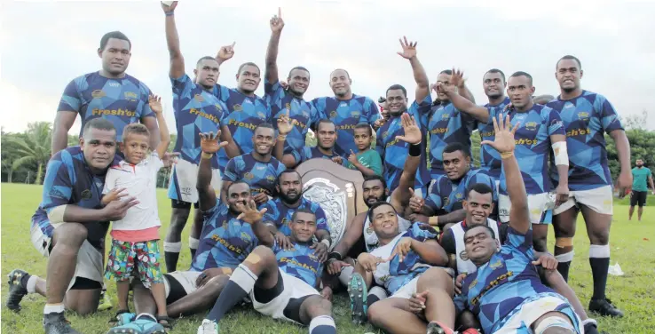  ??  ?? Navy rugby team after successful­ly defending the Escott Shield with a 49-8 win over QVSOB at Bidesi ground in Suva on April 14, 2018.
Photo: Karalaini Tavi