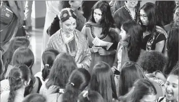  ?? Lawrence K. Ho
Los Angeles Times ?? MALAVIKI SARUKKAI greets fans after her display of Bharata Natyam at the Broad Stage on Sunday.