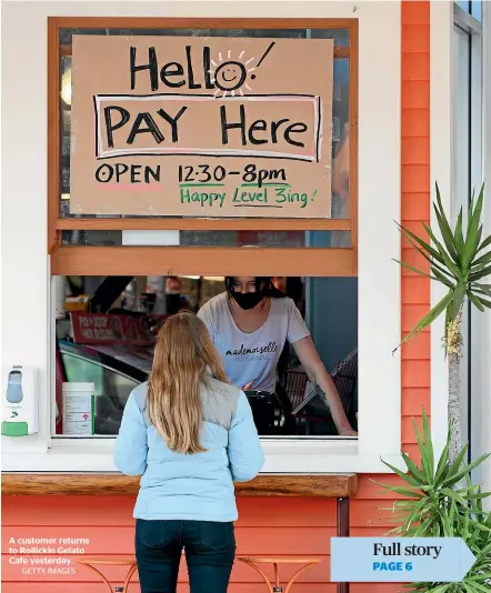  ?? GETTY IMAGES ?? A customer returns to Rollickin Gelato Cafe yesterday.