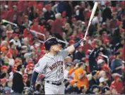  ?? Rob Carr Getty Images ?? ALEX BREGMAN’S grand slam against Fernando Rodney broke the game open in the seventh inning.