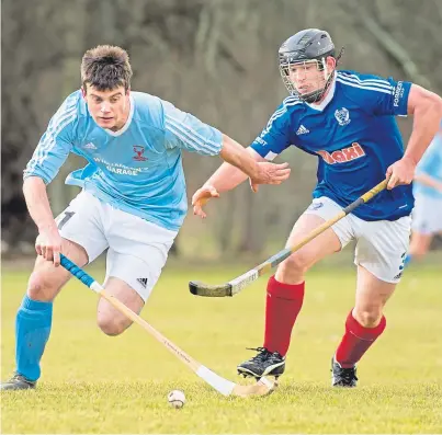  ??  ?? HURTING: Kyles Athletic captain Cammy Keith, right, is out for revenge against Oban Camanachd