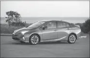  ?? DAVID DEWHURST PHOTOGRAPH­Y ?? The standard 2018 Toyota Prius offers 52 mpg.