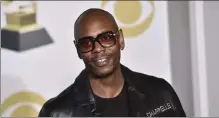  ?? CHARLES SYKES / AP FILE ?? Netflix said Friday that it had fired an employee for disclosing what it paid for the comedy special ‘The Closer,’ by Dave Chappelle, above, which some condemned as being transphobi­c.