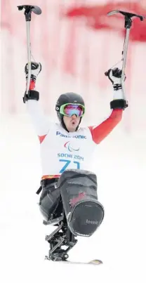  ?? LEAH HENNEL/ POSTMEDIA NEWS ?? Canada’s Josh Dueck celebrates his gold- medal finish Friday. He dedicated it to wife Lacy and daughter Nova.