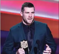  ?? Mark J. Terrill / Associated Press ?? T.J. Watt from the Pittsburg Steelers receives the AP Defensive Player of the Year Award during the NFL Honors show on Thursday in Inglewood, Calif.