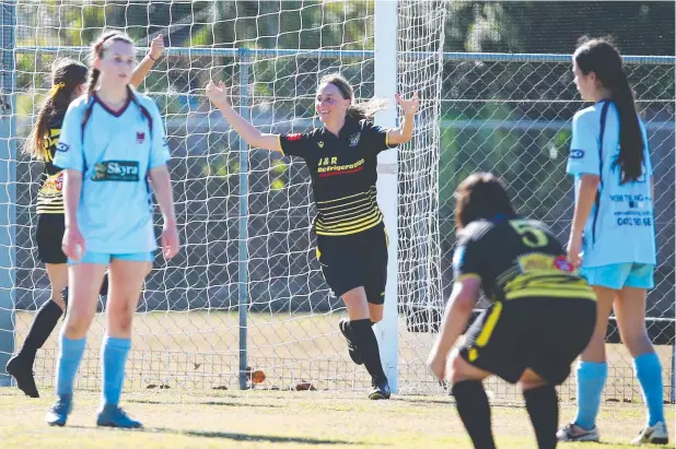  ?? Picture: BRENDAN RADKE ?? HUGE RELIEF: Edge Hill's Rose Calvert celebrates after scoring a goal in the semi-final against the JCU Strikers at Pennell Field, Trinity Beach.