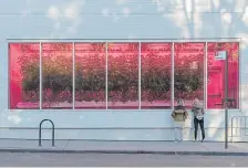  ?? Jeenah Moon, © The New York Times Co. ?? An exhibition “Countrysid­e, The Future” outside the Guggenheim Museum in New York is closed, but the greenhouse can still be viewed from the sidewalk.