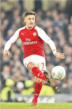  ??  ?? Arsenal’s Chilean striker Alexis Sanchez passes the ball during the English League Cup semi-final first leg football match between Chelsea and Arsenal at Stamford Bridge in London on January 10, 2018. - AFP photo
