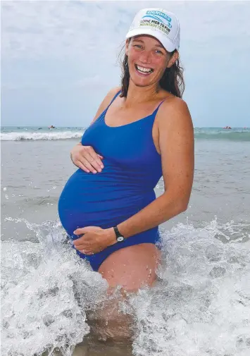  ?? Picture: PETER RISTEVSKI ?? MOTHER LODE: Morgan Lacey swam the Pier to Pub at 37 weeks’ pregnant.