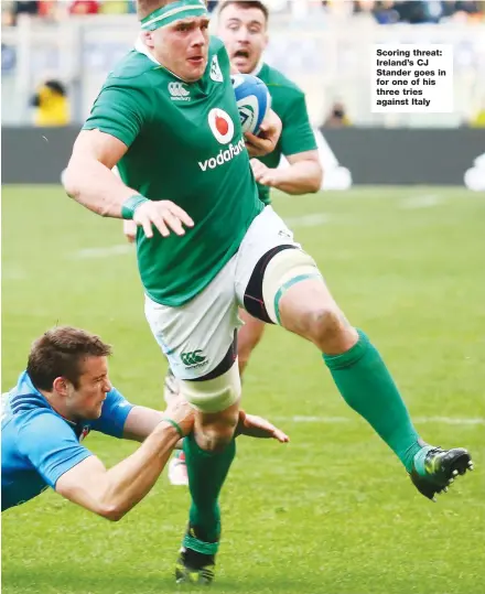  ??  ?? Scoring threat: Ireland’s CJ Stander goes in for one of his three tries against Italy