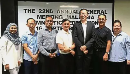  ??  ?? One for the album: (from left) Yang Fairuz Abdul Aziz, Francis Loh Soong Park, Datuk Jaya Al Bakri, Kau Git Kaur, Jimmy Tan Chi Min, Mike Ng Sik Hoi and Petrina Low posing for a group photograph after the MGF annual general meeting yesterday.