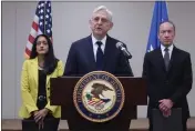  ?? PHOTOS BY ERIC GAY — THE ASSOCIATED PRESS ?? Attorney General Merrick B. Garland, center, with Associate Attorney General Vanita Gupta, left, and COPS Director Hugh Clements, Jr., right, speaks during a news conference were they shared the findings of a federal report into the law enforcemen­t response to a school shooting at Robb Elementary, Thursday, in Uvalde, Texas.