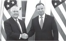  ?? THE ASSOCIATED PRESS ?? Rex Tillerson, U.S. Secretary of State, meets Friday with Polish President Andrzej Duda during a visit to Warsaw, Poland.