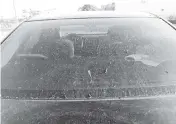  ?? Patrick Ferguson / Sierra Club Organizing Representa­tive for The Stop Sugar Field Burning
Campaign ?? Sugarcane ash covers the hood and windshield of a car in one of the rural towns between Lake Okeechobee and South Florida’s sprawling sugar fields.