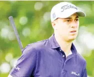  ??  ?? Justin Thomas plays his shot from the third tee during the first round of the U.S. Open Thursday in Mamaroneck, N.Y. (Photo by John Minchillo, AP)