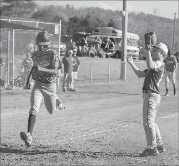  ??  ?? Chattanoog­a Valley’s Amarreon Turner crosses the plate during the Eagles’ game at Rossville last week. (Photo by Bambara Aven/www.bbaven.com) Ringgold takes three-team match