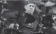  ?? RICH FURY Invision/AP ?? Neil Peart of Rush performs during the final show of the R40 Tour in Los Angeles in 2015. Peart, a renowned drummer and lyricist, died at his home Tuesday.