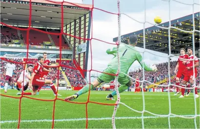  ?? Photograph: SNS ?? Hearts striker Tony Watt misses a brilliant chance near the end of the game