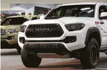  ?? Bob Owen / San Antonio Express-News file ?? Toyota Tacomas are among the midsize pickups whose production might shift outside the U.S. if not for the tariff.