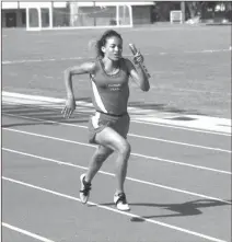  ?? File-LARRY GREESON / For the Calhoun TImes ?? Sonoravill­e’s Sarah Carroll completes the last leg of the 4x100 meter relay at the Region 6-AAA Meet last week.