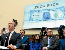  ?? AP ?? Facebook boss Mark Zuckerberg appears before the House financial services committee as it examined his cryptocurr­ency project, and came in for searing questionin­g.